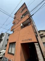 ケアンズクラブ岸里の外観