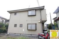 エクセル飯山満B棟の外観