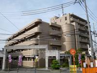 大阪府大東市灰塚2丁目の賃貸マンションの外観