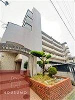 サン春日第2マンション104の外観