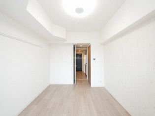 プレサンスOSAKA DOMECITY クロスティの使い勝手のいい寝室です